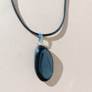 Colgante en metal de onix.