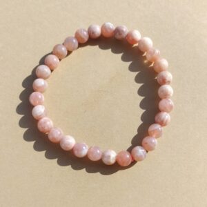 Pulsera de Piedra luna naranja en bola de 6mm.